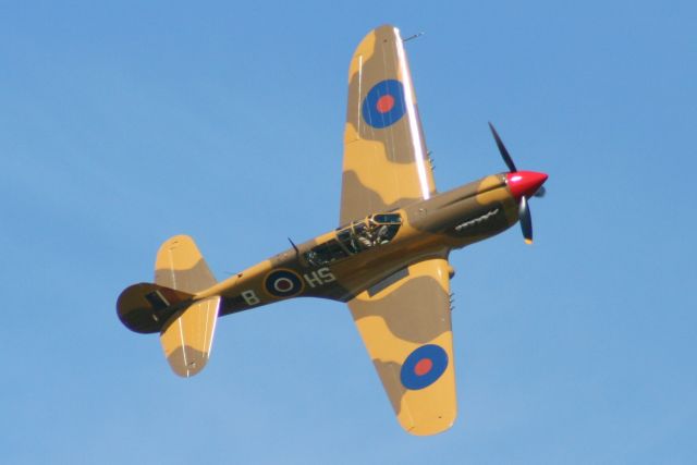 C-FVWC — - A P-40N KittyHawk own and operated by Wings of Canada, performing a roll over at this years 2011 open house.