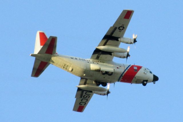 Lockheed C-130 Hercules (N1502) - Coast Guard C-130H flying east above 110th Ave N in Pinellas Park before turning north to Clearwater airport.