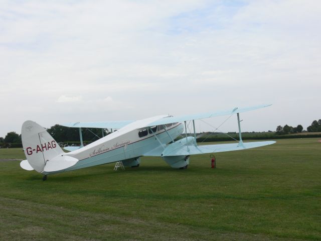 De Havilland Dragon Rapide (G-AHAG) - This photo of de Havilland DH89A Dragon Rapide civilian registration G-AHAG c/n 6926 was taken during Shuttleworth Family Airshow on 4 August 2019.