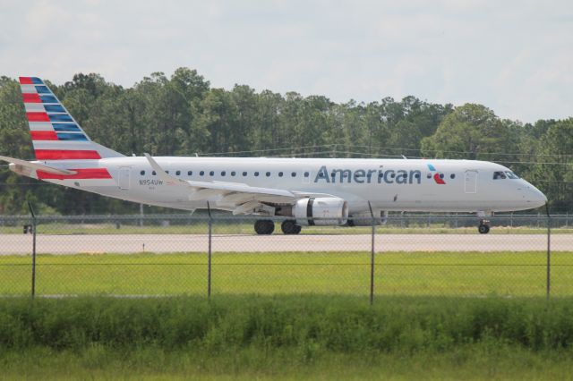 Embraer ERJ-190 (N954UW) - American Flight (N954UW) arrives at Southwest Florida International Airport following flight from Philadelphia International Airport