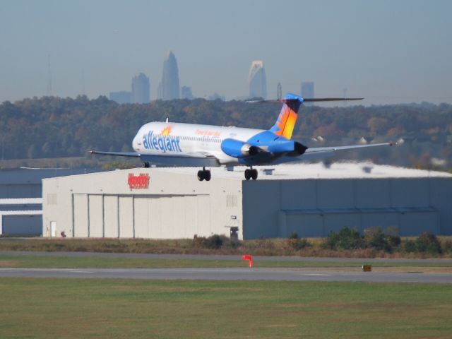 McDonnell Douglas MD-83 (N865GA) - Arriving from Orlando-Sanford (KSFB) with downtown Charlotte, NC in the background. Soon Allegiant will be flying to/from Clearwater/St. Pete-Tampa (KPIE) from Concord Regional Airport (KJQF), "Gateway to Charlotte." - 10/27/14 