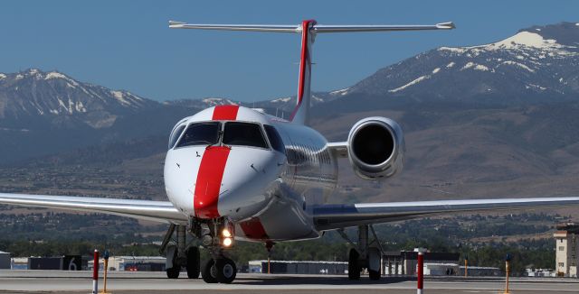 Embraer ERJ-135 (N260JX) - Taxiing off Charlie to the apron.