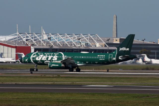 Airbus A320 (N746JB) - JetBlue A320 (N746JB) in revised NY Jets livery departing BOS on 09/27/17.