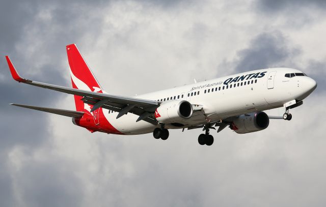 VH-VXR — - VXR On final to 25 at YSSY with a miserable backdrop. Taken from Ross smith avewith 70-200mm