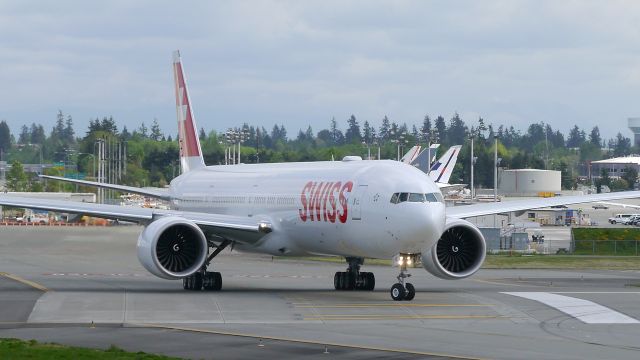 BOEING 777-300 (HB-JNC) - SWR7531 taxis onto Rwy 16R for its delivery flight to ZRH/LSZH on 4.28.16. (ln 1391 / cn 44584).