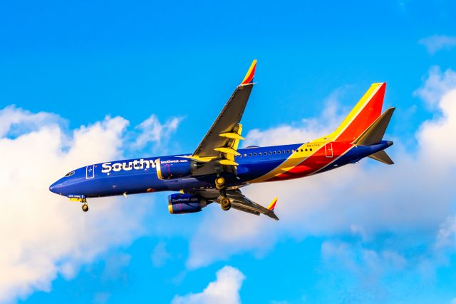 Boeing 737 MAX 8 (N8771D) - Southwest Airlines 737 MAX 8 landing at PHX on 12/14/22. Taken with a Canon R7 and a Sigma 50mm Art lens.