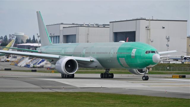 BOEING 777-300 (N722AN) - BOE306 taxis onto runway 16R for its maiden flight on 4/1/13. (LN:1095 cn 31547).