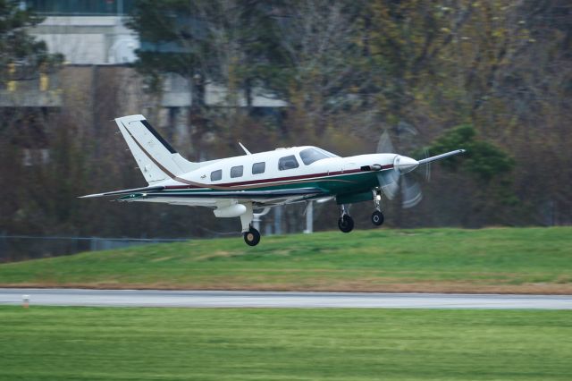 Piper Malibu Mirage (N529PM) - N529PM is a Piper PA-46 seen here departing Atlanta's PDK executive airport. I shot this with a Canon 500mm lens. Camera settings were 1/250 shutter, F4, ISO 160. Please check out my other photography. Votes and positive comments are always appreciated. Questions about this photo can be sent to Info@FlewShots.com