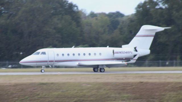 IAI Gulfstream G280 (N504RP) - Taken just as the thrust-reversers were opening up during its landing roll.