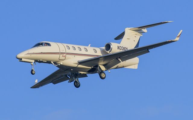 Embraer Phenom 300 (N331QS) - Runway 20R arrival @KDPA.