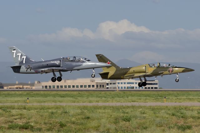 Aero L-39 Albatros (N8124N) - These two Aero L-39's departed in formation out of Centennial. I have heard that since taking this photo, "Triple Seven" had an incident at an airshow with another L-39 and belly-landed.