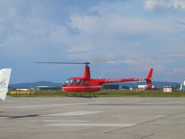 Robinson R-44 (C-FRSV) - Lifting off for Canadian Helicopters. Goose Airport Lab