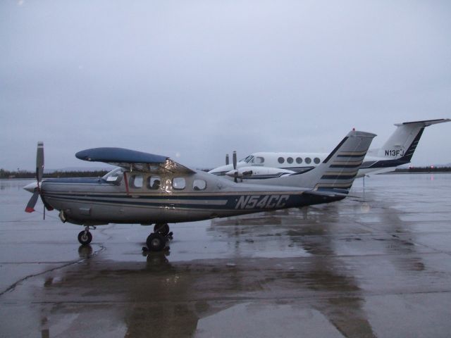 Cessna Centurion (N54CC) - Parked at Irving Aviation FBO, Goose Airport NL. June 11/09