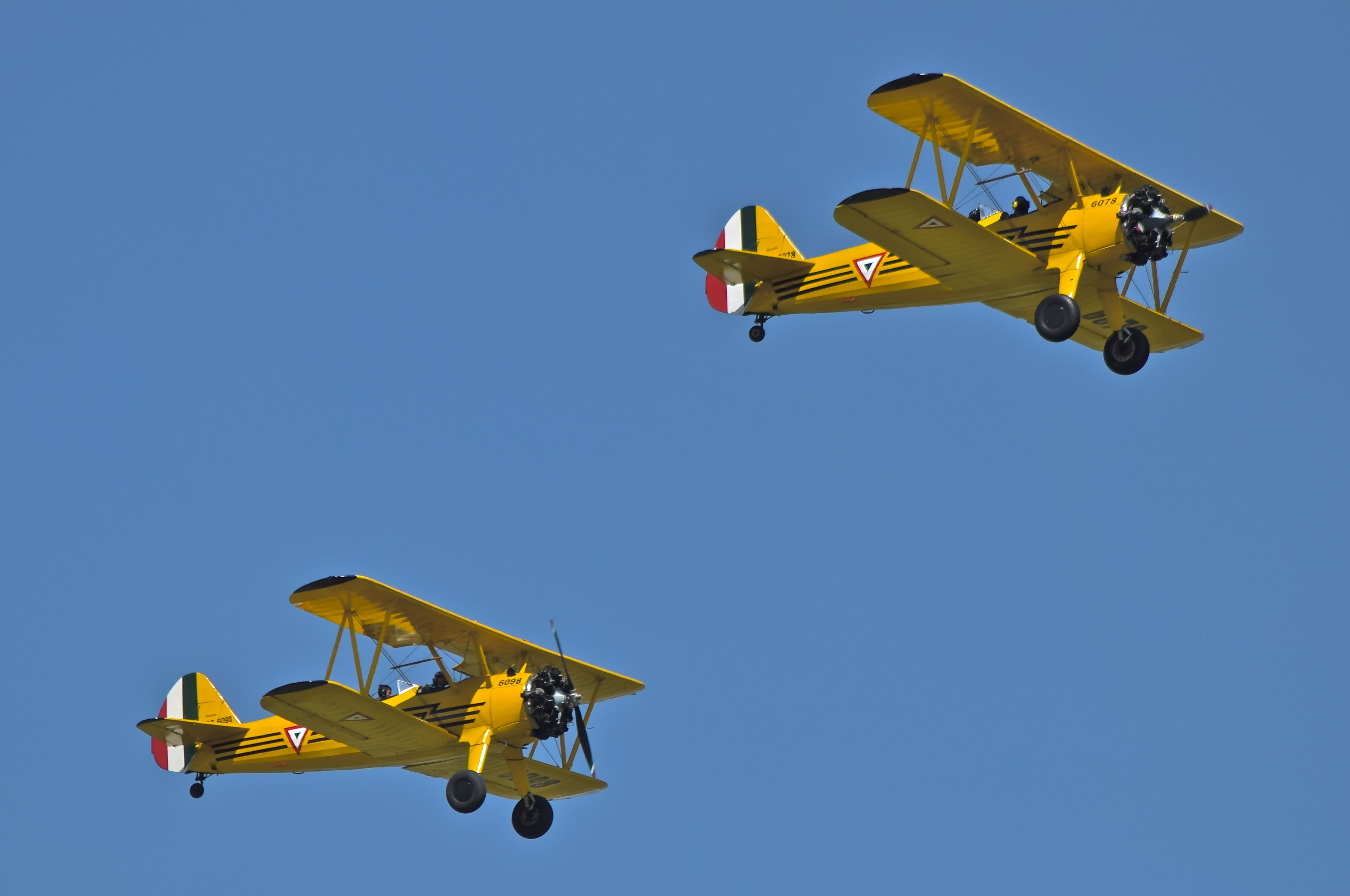 Boeing PT-17 Kaydet (FAM6078) - Airshow over Santa Lucia Air Base. A pair of Boeing PT-17 Kaydet. FAM 6078 and FAM6098 make a fly pass. 