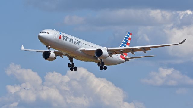 Airbus A330-300 (N277AY) - American Airlines Airbus A330-300 (N277AY) arrives at KCLT Rwy 36R on 06/01/2019 at 3:56 pm. In the lower left corner you can also see American Airlines Airbus A330-200 (N293AY) turning for final approach