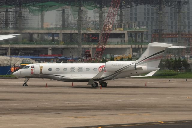 N982RW — - 10th June., 2022: FIFA World Cup Trophy comes to Bangladesh! Privately owned Gulfstream G600 wearing sponsor stickers is seen waiting on the tarmac at Dhaka's Zia International Airport while the trophy is on display at the city's Army Stadium a few miles south of the airport.