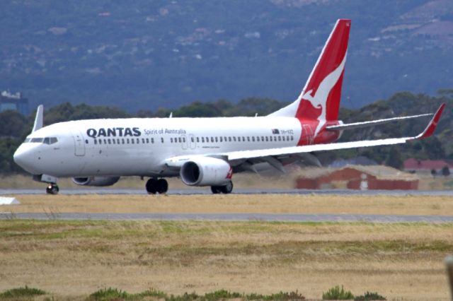 Boeing 737-800 (VH-VZZ) - On taxi-way heading for Terminal 1, after landing on runway 23. Friday 1st February 2013.