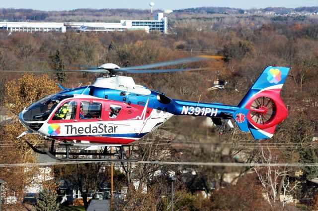 Eurocopter EC-635 (N391PH) - The Flight for Life Trauma Helicopter at Appleton Medical Center as seen from the building roof.