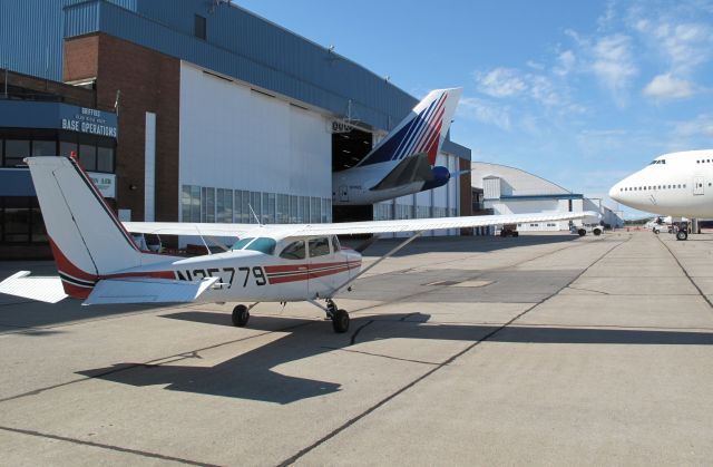 Cessna Skyhawk (N35779) - Parked among some big iron.