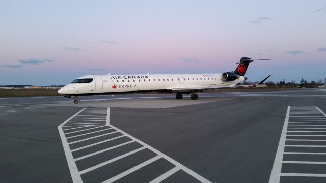 Canadair Regional Jet CRJ-900 (C-GLJZ) - AC 8070 to YVR Apron IV. Only seen this girl here once once before...Christmas eve no less