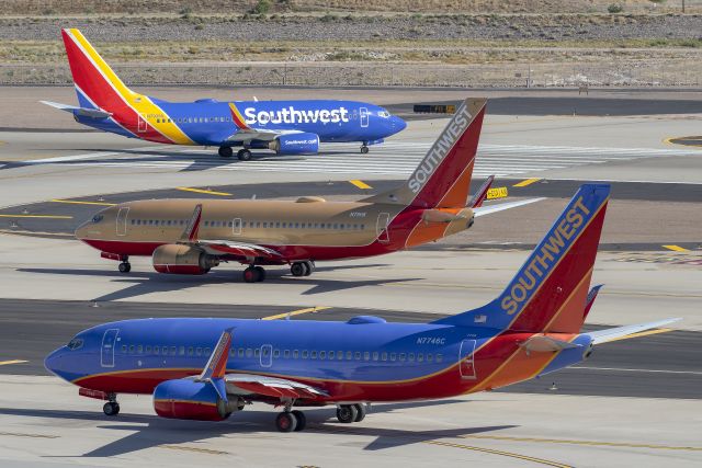 Boeing 737-700 (N7746C) - Three different chapters of Southwest at PHX!