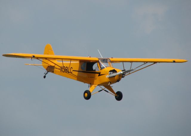 Piper L-21 Super Cub (N38LC) - Doing touch and goes on runway 14 at Downtown Shreveport.