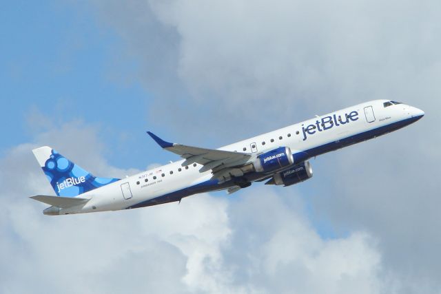Embraer ERJ-190 (N317JB) - Jet Blue Flight 1188 departs Runway 14 at Sarasota-Bradenton International Airport
