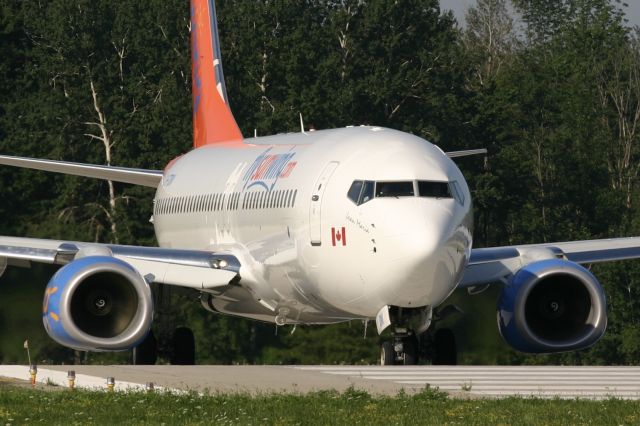 Boeing 737-800 (C-FTDW) - August 4, 2006 - morning departure from London for Halifax