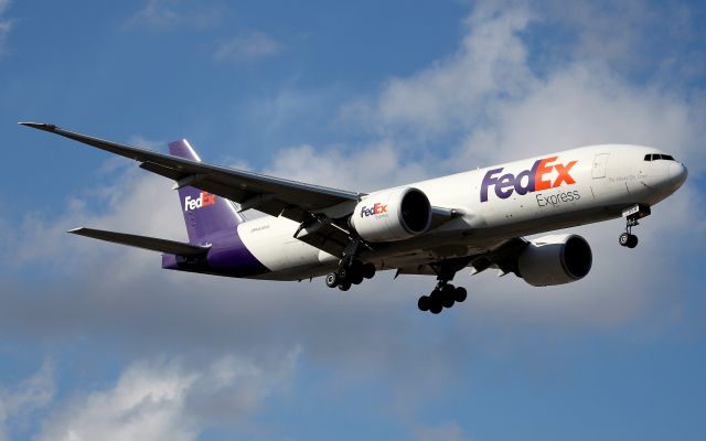 BOEING 777-200LR (N858FD) - Short Final to Rwy 16R-Soon to Replace MD11s into Sydney on all flights