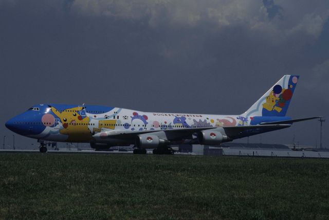 Boeing 747-400 (domestic, no winglets) (JA8964) - Taxing at Tokyo-Haneda Intl Airport on 1999/08/23 " Pokemon c/s "