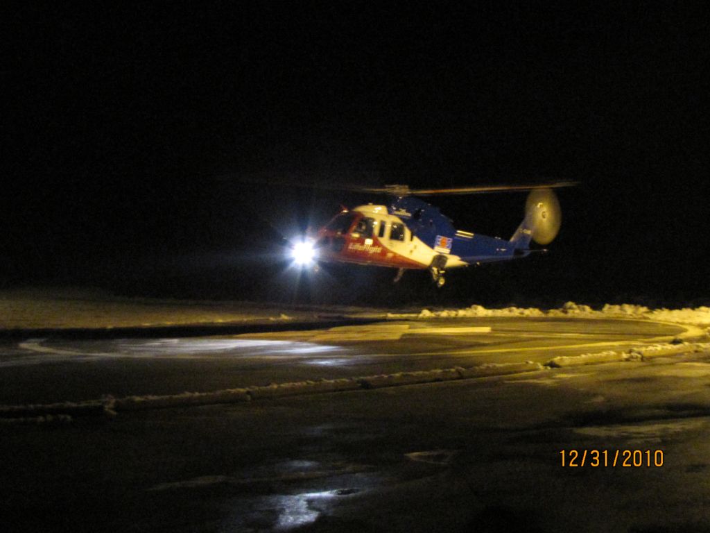 Sikorsky S-76 (C-GIMN) - Life Flight lifting the pad at South Shore Regional Hospital Bridgewater.. Dec 31,2010