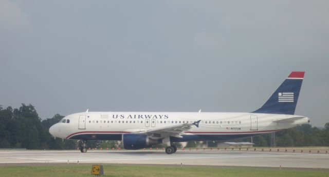 Airbus A320 (N117UW) - A US Airways Airbus a320 N117UW about to takeoff at Charlotte Douglas International Airport (KCLT) on September 17, 2014.