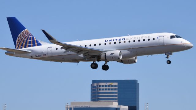 Embraer 170/175 (N149SY) - N149SY just a few seconds from touchdown on runway 20R.