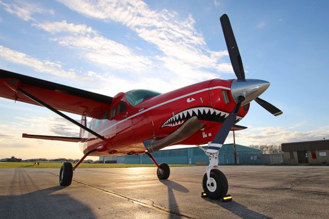 Cessna Caravan (N208B) - N208B, “Redbird”, Cessna 208B Caravan I, just before sunset at KTOL on 22 Apr 2019.