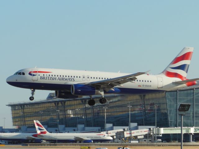 Airbus A320 (G-EUUS) - British Airways (BA) G-EUUS A320-232 [cn3301]br /London Heathrow (LHR). British Airways flight BA799 arriving from Helsinki Vantaa (HEL). br /Taken from Viewing Area, T5 Thistle Hotel Bar, Bath Road (adjacent to runway 9L)br /2013 07 19  a rel=nofollow href=http://alphayankee.smugmug.com/Airlines-and-Airliners-Portfolio/Airlines/EuropeanAirlines/British-Airways-BA/https://alphayankee.smugmug.com/Airlines-and-Airliners-Portfolio/Airlines/EuropeanAirlines/British-Airways-BA//a