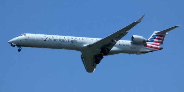 Canadair Regional Jet CRJ-900 (N609NN) - On final is this 2019 American Airlines Eagle Canadair Regional Jet 900LR in the Summer of 2021.