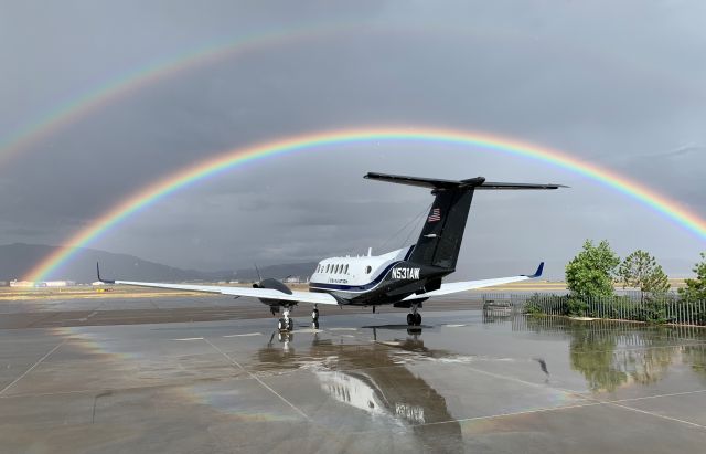 Beechcraft Super King Air 300 (N531AW) - Summer time rain in the high desert.