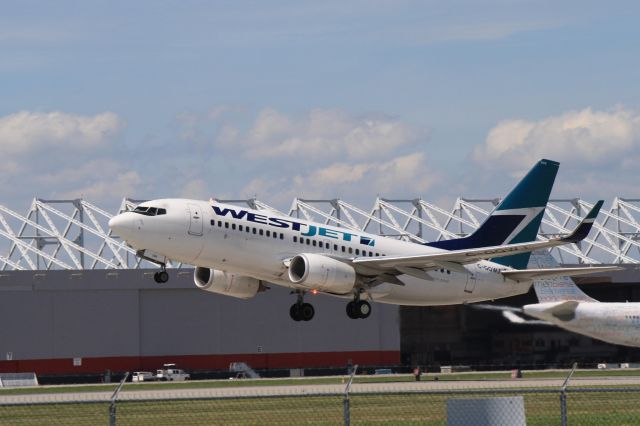 Boeing 737-700 (C-GQWJ) - Departing from Montreal-Trudeau