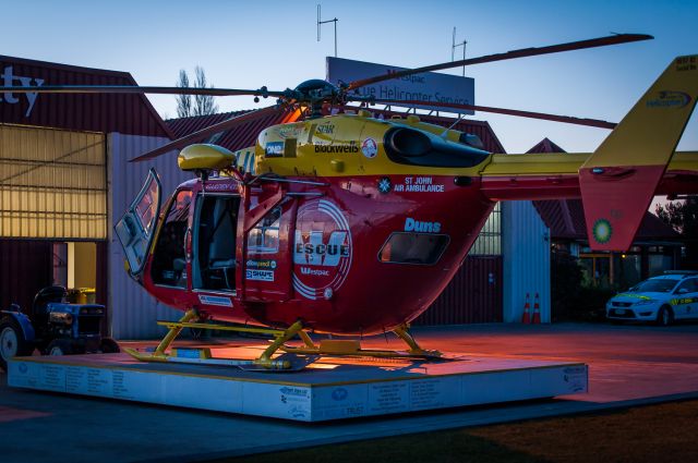 ZK-HJC — - On the pad at Garden City Helicopters, just after sunset, with the gas tank having just been filled up.