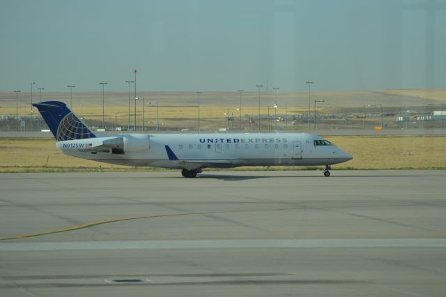 Canadair Regional Jet CRJ-200 (N912SW) - Taxiing to runway in DEN