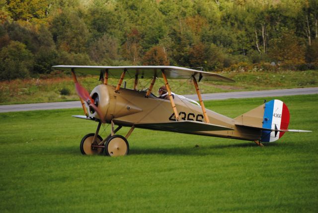 — — - Earlier today, September 29th, 2018, a Thomas-Morse S-4B Scout (nicknamed "Tommy") flew for the last time in Ithaca, NY (the same town it was built in). The plane took off in front of a large crowd (while I cant give you an exact number, I would guess over 1,000). While the airport has a rather large runway (for the amount of traffic it receives), the plane took off in the grass in between the runway and taxiway A, between E and G. I was lucky enough to squeeze my way through to the front of the crowd and got this photo moments after the plane landed for the last time. Giving that this is the only Tommy that is fit for operation, it was likely the last time one would fly. While the atmosphere of the event was full of excitment as if we were at an airshow, it was a little sad as an avgeek seeing such a beautiful old plane land for likely the last time. From my understanding, this Tommy is to be kept at a museum in Ithaca, which at least is better than the fate of most other aircrafts we see retired nowadays. 