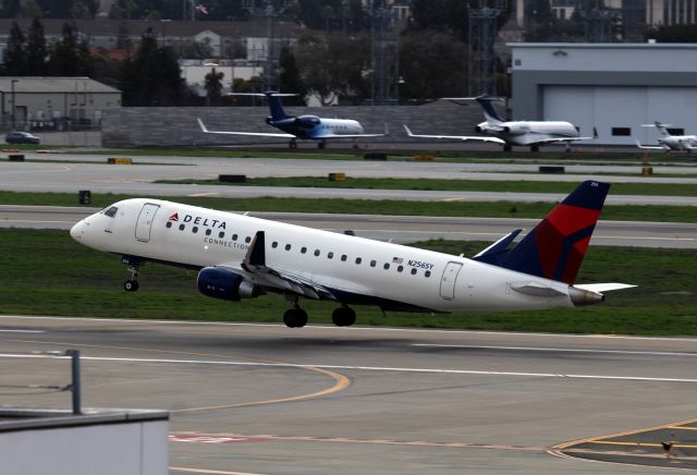 Embraer 175 (N256SY) - KSJC - having lived in Palo Alto for 1.3ys 2022-2023 I was able to get to the old stomping grounds 1 or 2 times,,,but found SJC virtually worthless for jet photos. Having filmed at SJC from late 1960s, to about 2007..the entire airport is mostly blocked from any good vantage points except the north end of the parking structure Terminal A garage....which is blocked in many areas for rental and maintenance parking areas. One now has to park and walk up to the only accessible area with a view. Im done whining, ( grin) so here is a view of 12LR departure of the new jets for Delta rotating out for? Photo date Jan 8, 2023.