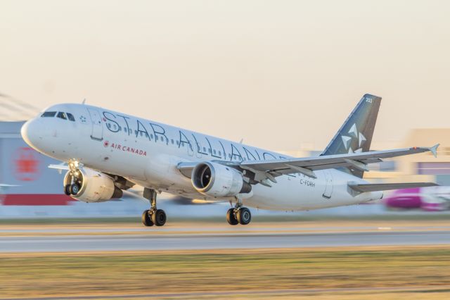 Airbus A320 (C-FDRH) - Departing YUL for an unknown destinationbr /Shot in 2019