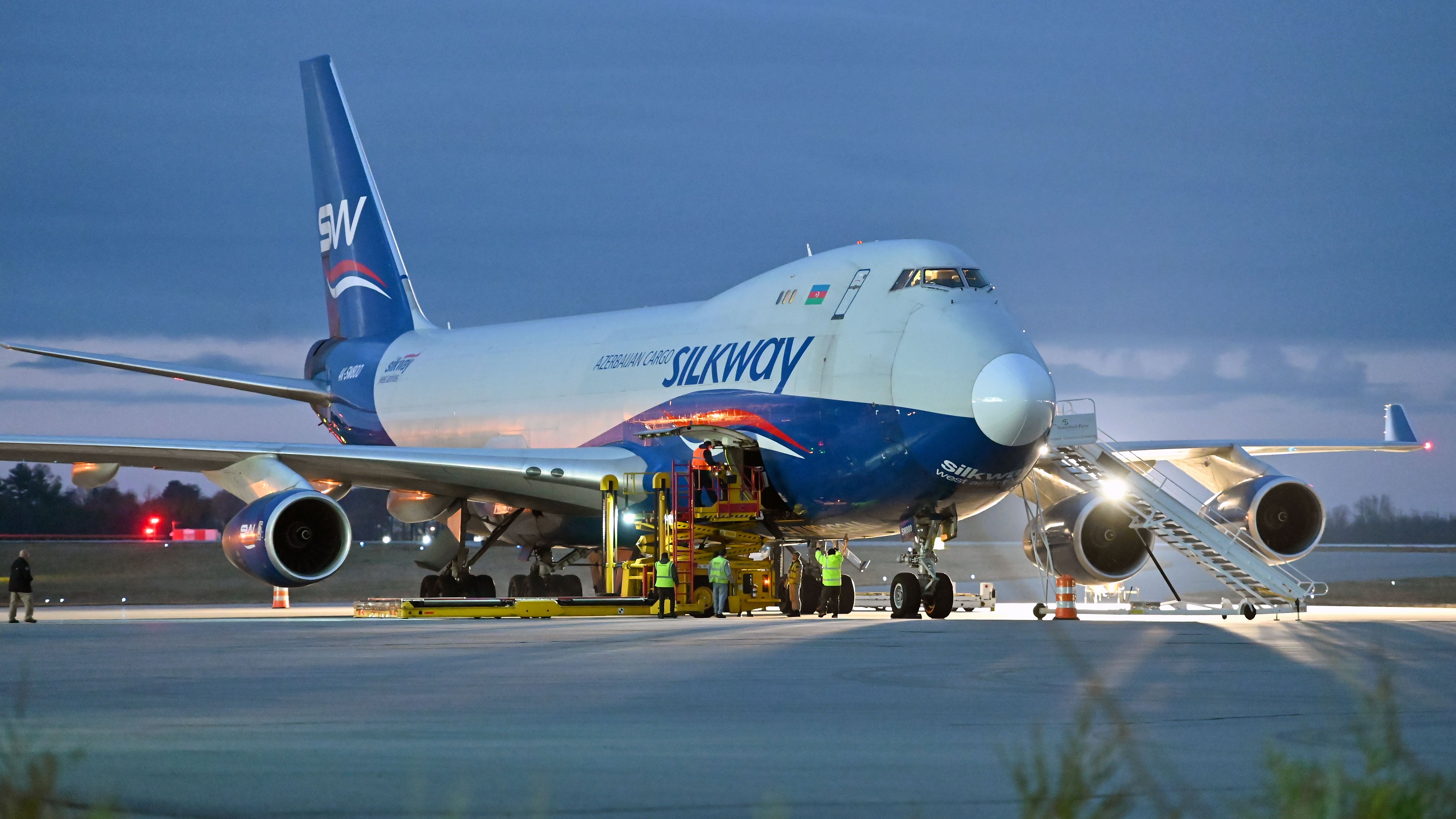 Boeing 747-400 (4K-SW800) - Silk Way West Airlines Boeing 747-400F (4K-SW800) being loaded by Samaritan's Purse at KGSO on 3/10/22 at 6:50 pm.