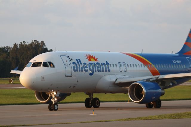 Airbus A320 (N245NV) - 7/1/23 taxiing out to Rwy 09L for a sunset departure