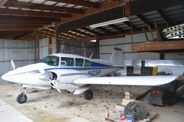 Piper Apache (N1231P) - Twin Oaks' multi-engine trainer resting in the hangar.