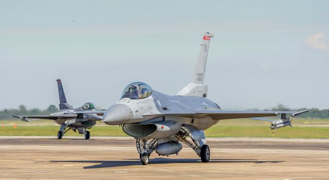 Lockheed F-16 Fighting Falcon (N89007) - Two Oklahoma Air National Guard F16s taxi to parking at KEFD