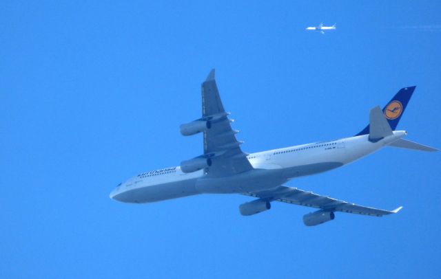 Airbus A340-300 (D-AIGL) - Shown here is a Lufthansa Airbus A340-300 a few minutes until it lands completing the Frankfurt to Philadelphia flight with the Jet Blue heading northeast in the Winter of 2018.