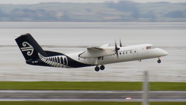 de Havilland Dash 8-300 (ZK-NEA) - Slingshotting off 23L.