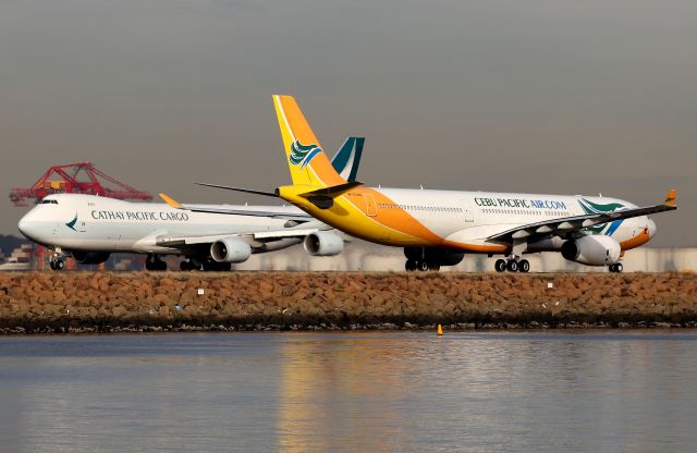 Airbus A330-300 (RP-C3344) - Two Freighters Pass.B-LJI Take Off Roll -Cebu Pacific (cargo only) Taxi Roll.